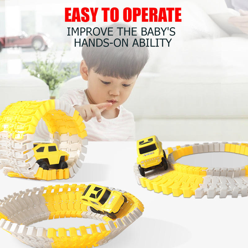 Child playing with yellow toy cars and flexible track at Tafeen Toys