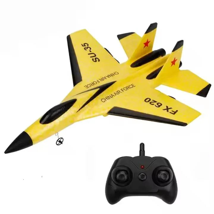 Yellow remote control jet toy with black controller, labeled FX 520 SU-35 at Tafeen Toys